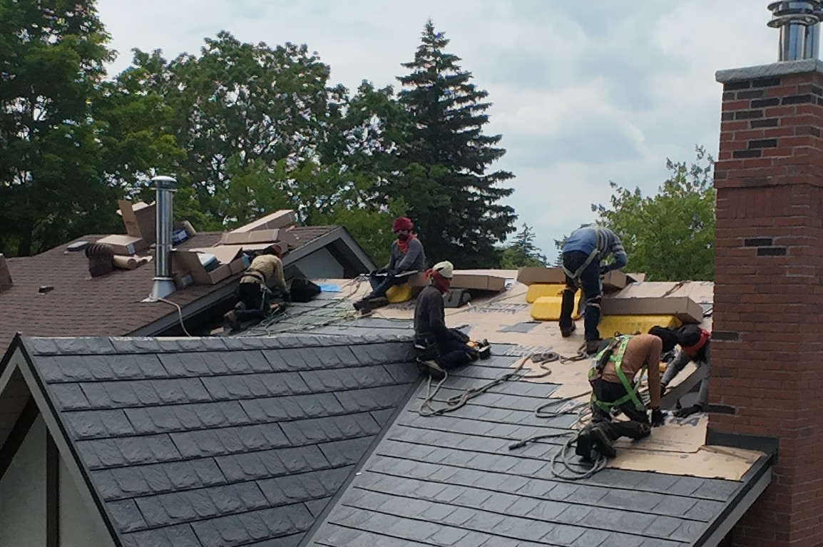 Classic Products crew installing a metal roof in Ontario