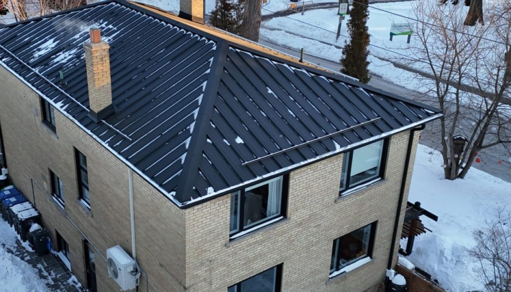 Steel Standing Seam Black roof in Mississauga, ON with rail system snow guards